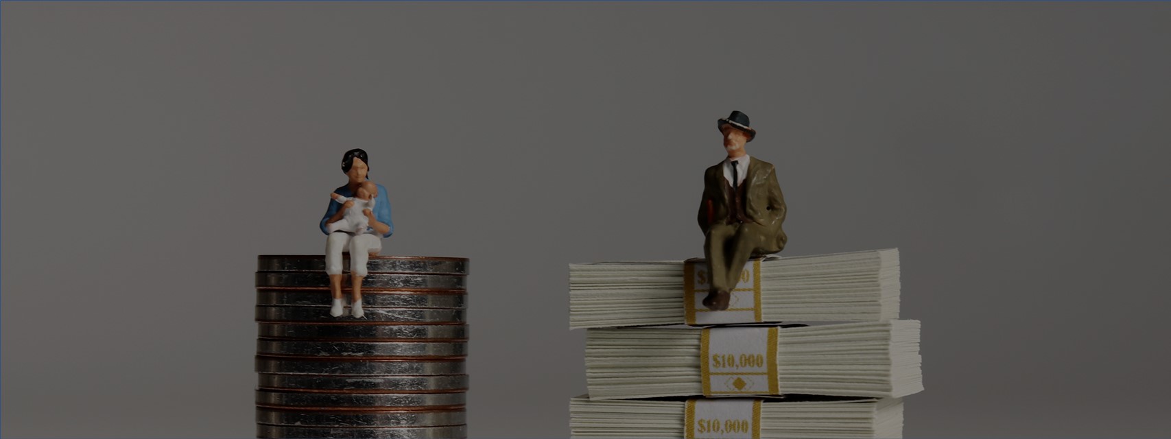 A woman with a baby sitting on a stack of coins and a man in a suit sitting on a stack of $10,000 packets of bills.