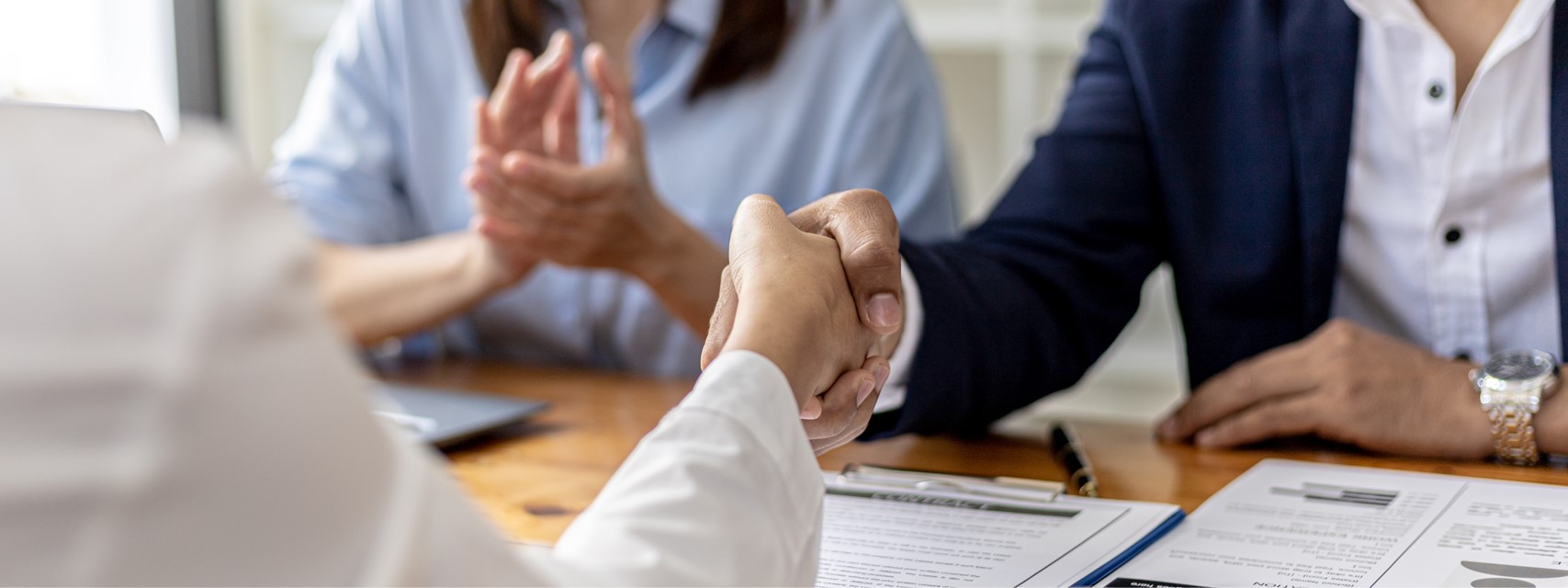 handshake over job offer