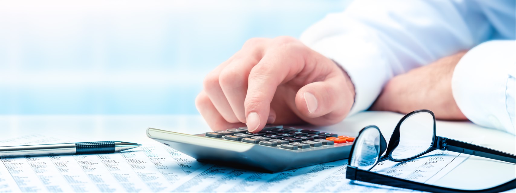 Businessman calculating effect of financial restatement on compensation