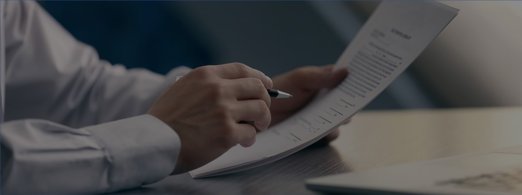 Businessman reviewing an equity award agreement