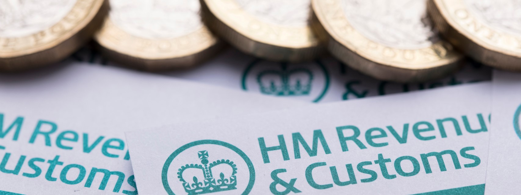 British pound coins with HMRC forms