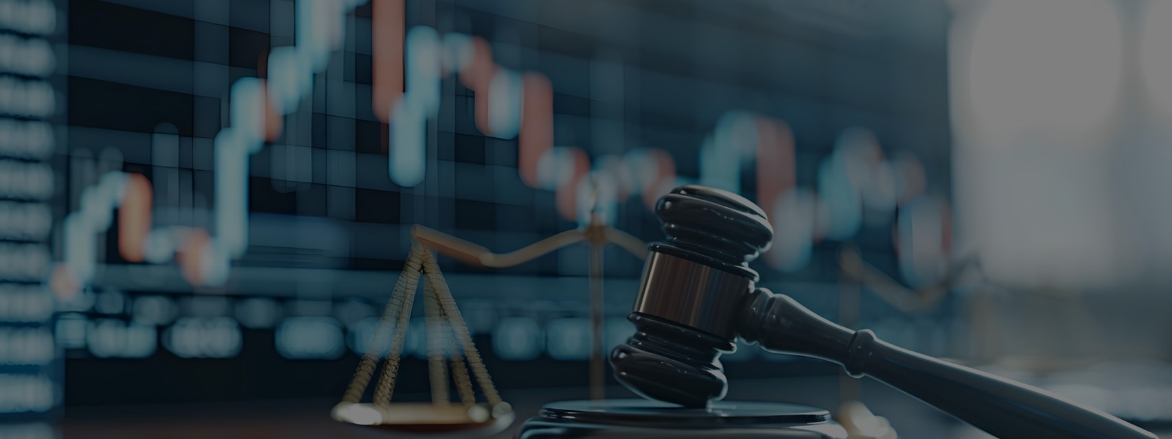 Stock market chart with judge's gavel and scales of justice