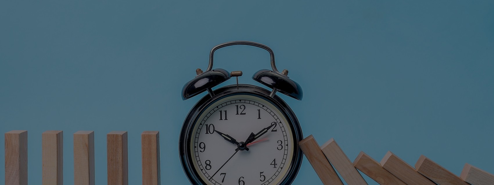 A clock as tiles cascade downward