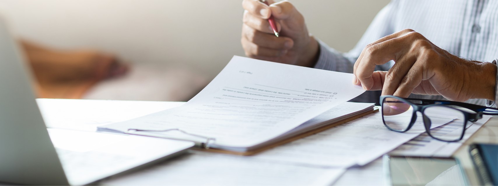 Shareholder reviewing a proxy statement that is much smaller than proxy statements are in real life