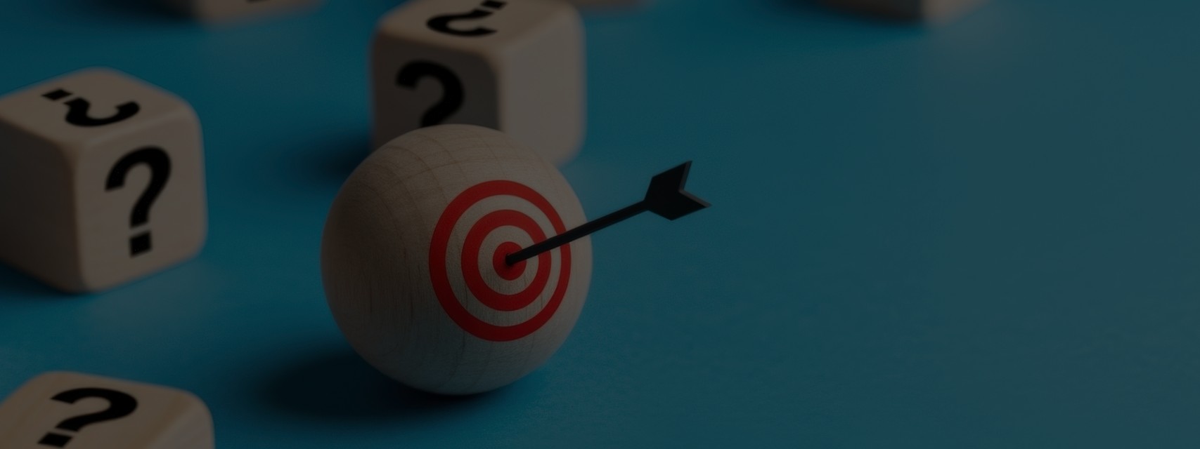 Arrow hitting bullseye surrounded by question marks, represents target achievement amidst uncertainty