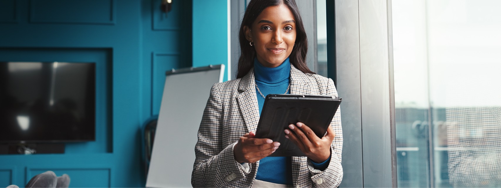 confident and woman with tablet