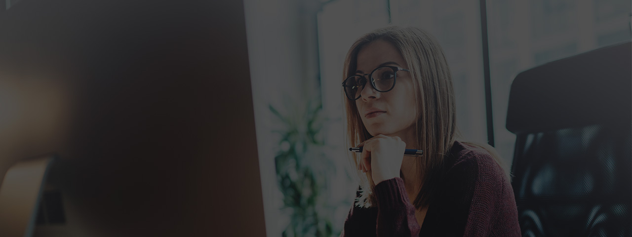 Businesswoman viewing computer monitor