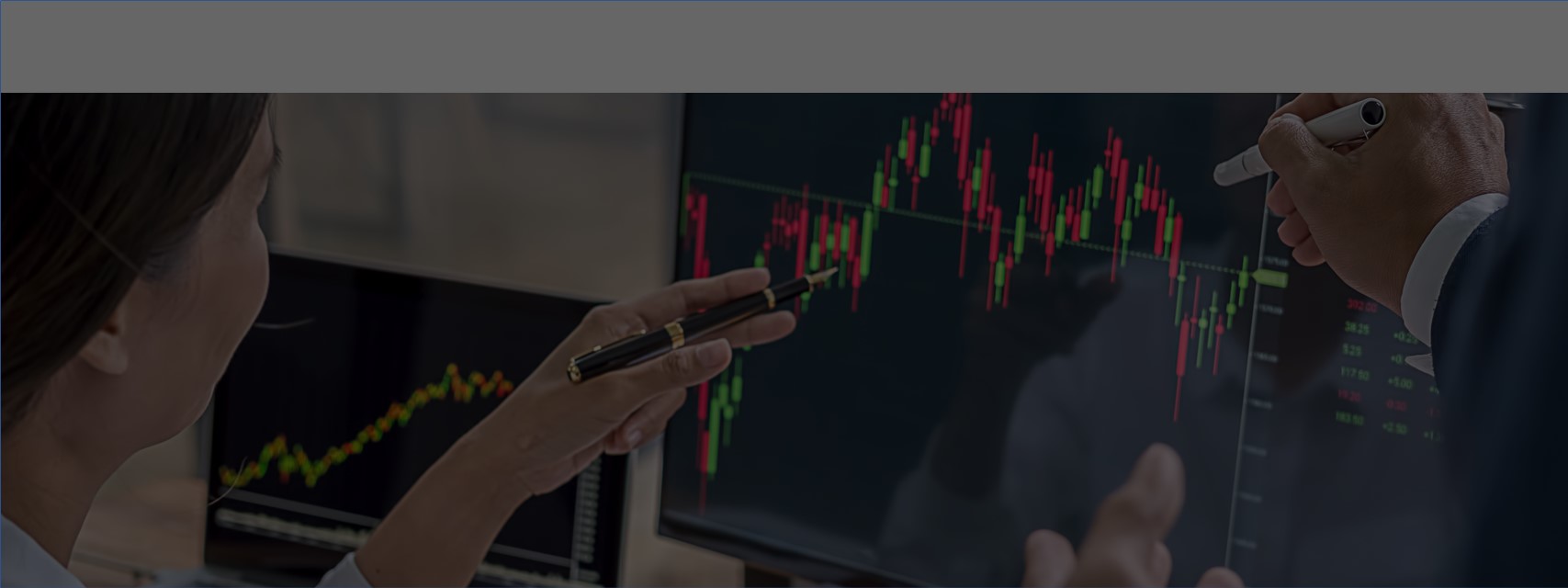 woman pointing at stock chart and discussing equity grants with colleague