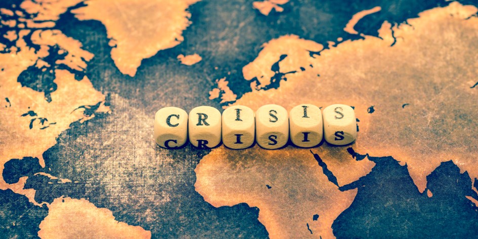 Crisis spelled out in blocks over global map