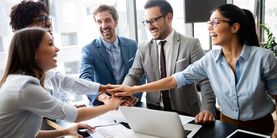 Group of business people celebrating success.