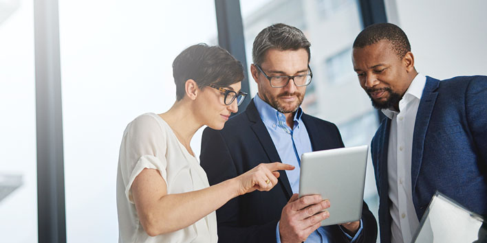 Equity professionals reading an SEC announcement affecting equity plans