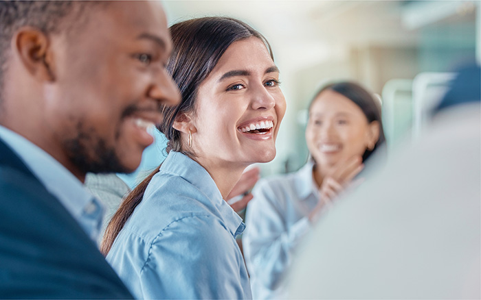 Businesswoman engaged in team meeting Team meeting engagement
